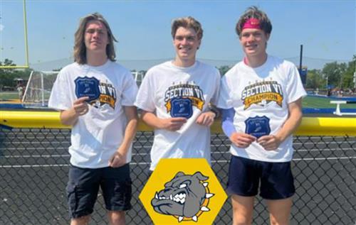 Kenmore East athletes post with their Section VI patches.